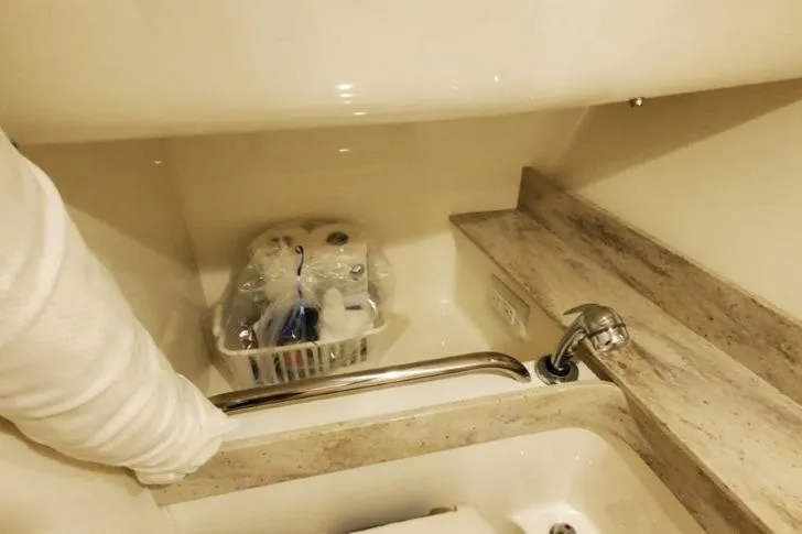 Slide: The Image of 2017 Formula 350 Crossover Bowrider bathroom sink with toiletries and towel. - 21