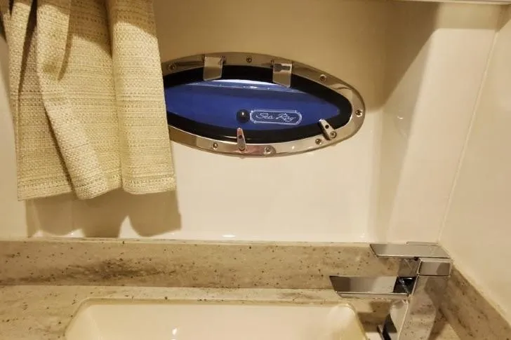 Slide: The Image of Bathroom interior of a 2017 Formula 350 Crossover Bowrider with porthole window. - 22