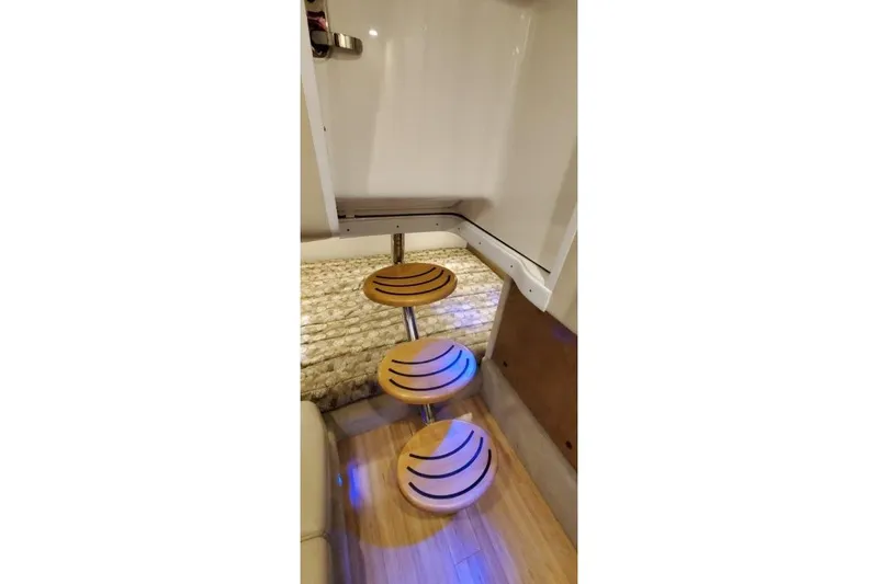 Slide: The Image of 2017 Formula 350 Crossover Bowrider interior with wooden steps and modern design. - 41