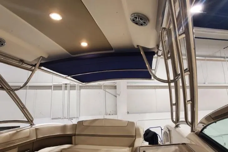 Slide: The Image of 2017 Formula 350 Crossover Bowrider interior with beige seating and stainless steel accents. - 64