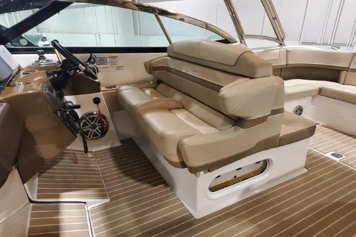 Slide: The Image of 2017 Formula 350 Crossover Bowrider interior with luxurious tan seating and sleek design. - 71