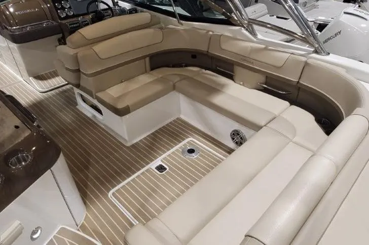 Slide: The Image of Luxurious interior of 2017 Formula 350 Crossover Bowrider with beige seating and wood flooring. - 75