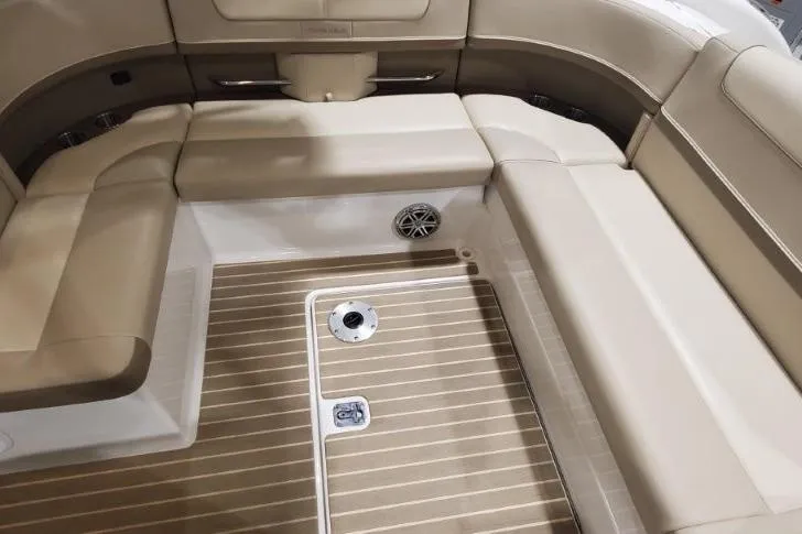 Slide: The Image of 2017 Formula 350 Crossover Bowrider interior with beige seating and wood-patterned flooring. - 78