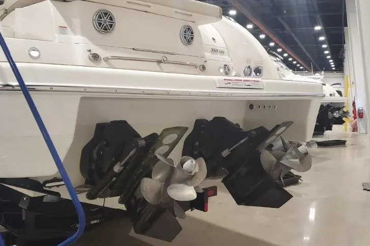 Slide: The Image of 2017 Formula 350 Crossover Bowrider with dual propellers in a showroom setting. - 82