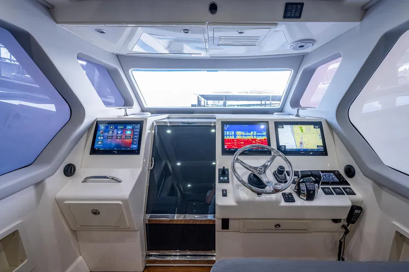 Slide: The Image of Modern cockpit of 2021 Gulf Crosser 52 yacht with advanced navigation systems. - 12