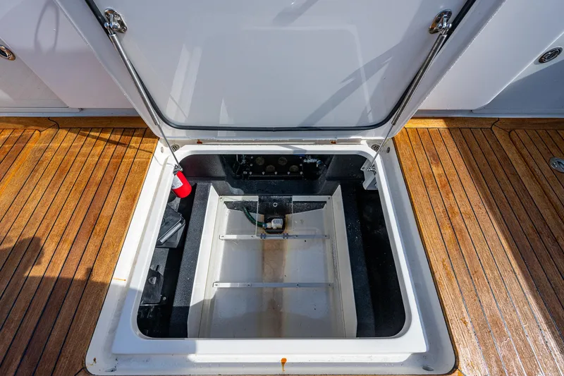Slide: The Image of Open hatch on the 2021 Gulf Crosser 52 boat with teak deck. - 20