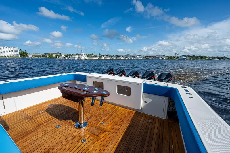 Slide: The Image of 2021 Gulf Crosser 52 boat with wooden deck and ocean view. - 25