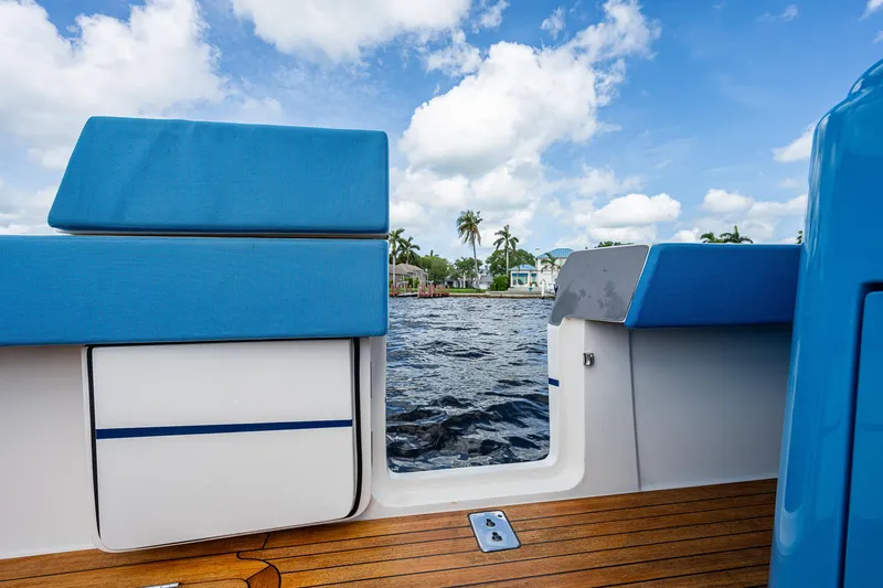 Slide: The Image of View from the deck of a 2021 Gulf Crosser 52 yacht with blue seating. - 27