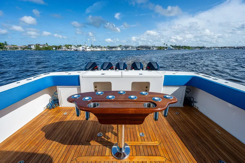 Slide: The Image of 2021 Gulf Crosser 52 boat deck with wooden flooring and ocean view. - 36