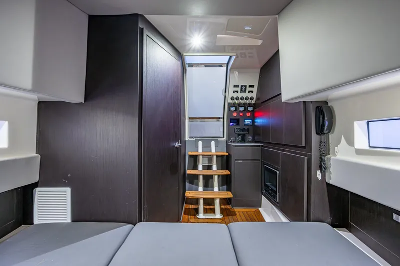 Slide: The Image of Interior of 2021 Gulf Crosser 52 yacht with modern design and control panel. - 43