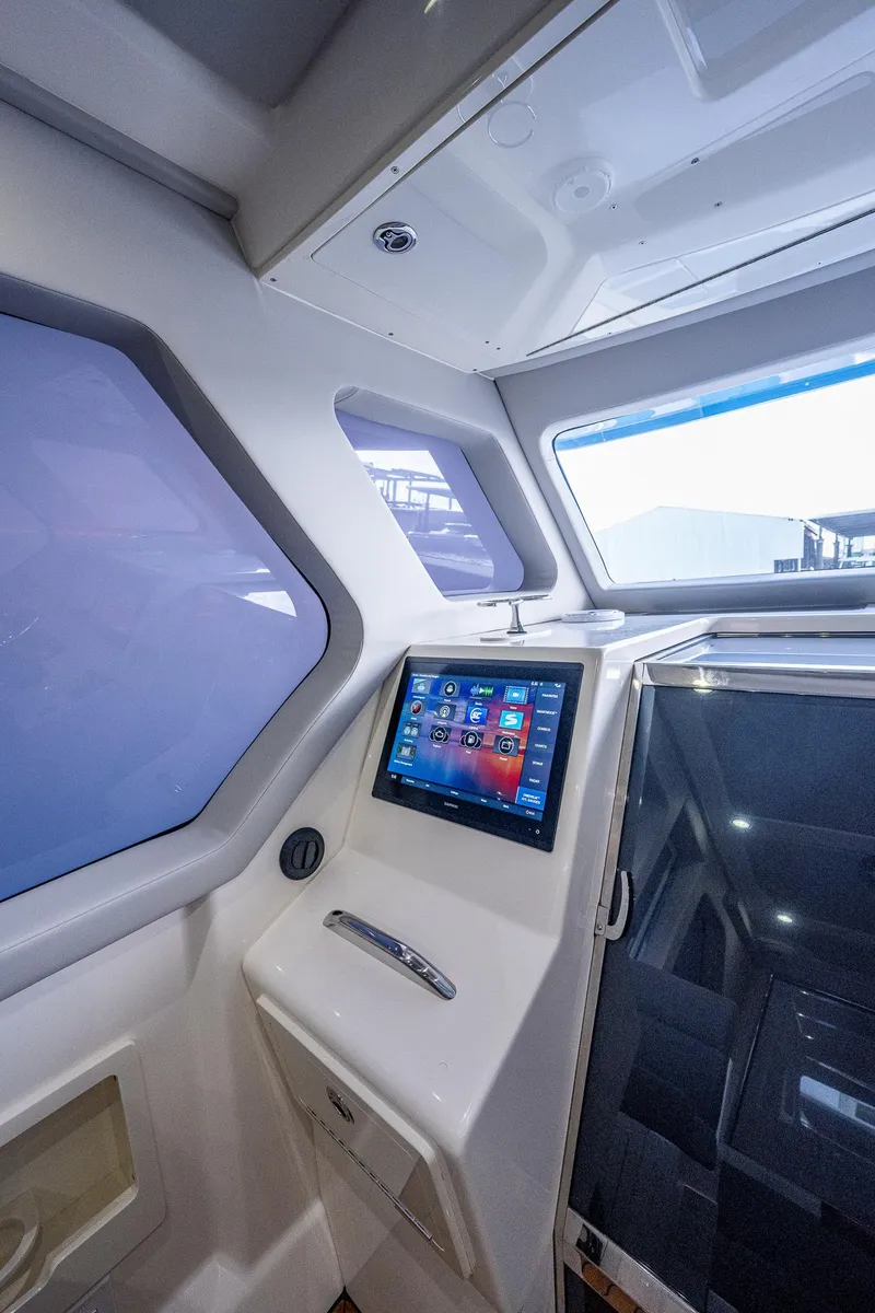 Slide: The Image of Interior cockpit of 2021 Gulf Crosser 52 with touchscreen navigation system. - 5
