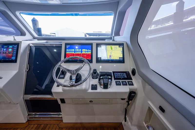 Slide: The Image of Cockpit of 2021 Gulf Crosser 52 yacht with advanced navigation systems. - 7