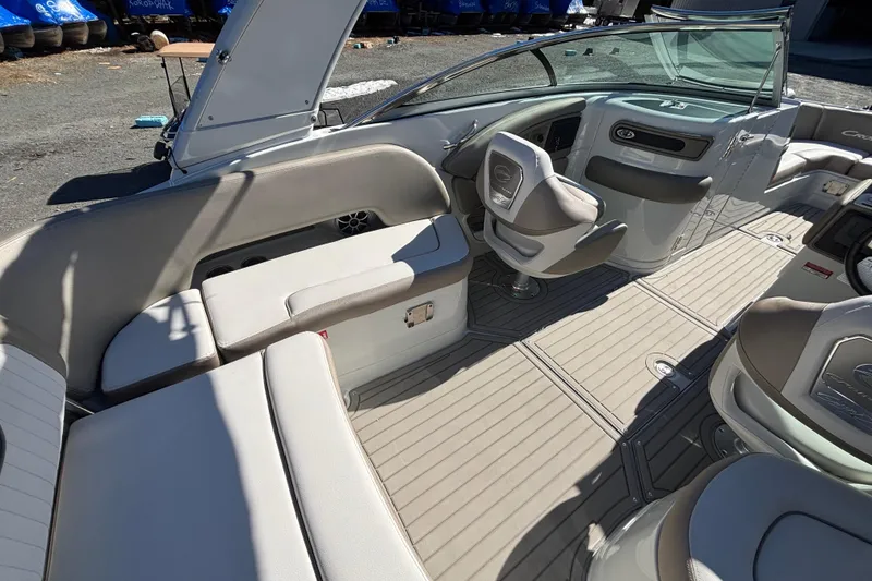 Slide: The Image of 2026 Crownline 278 SS boat interior with luxurious seating and modern dashboard design. - 10