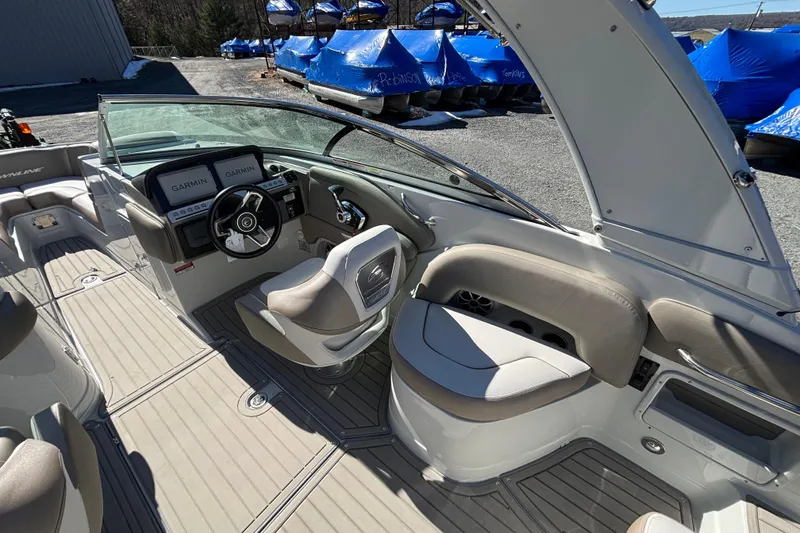 Slide: The Image of 2026 Crownline 278 SS boat interior with Garmin navigation, sleek design, and comfortable seating. - 11