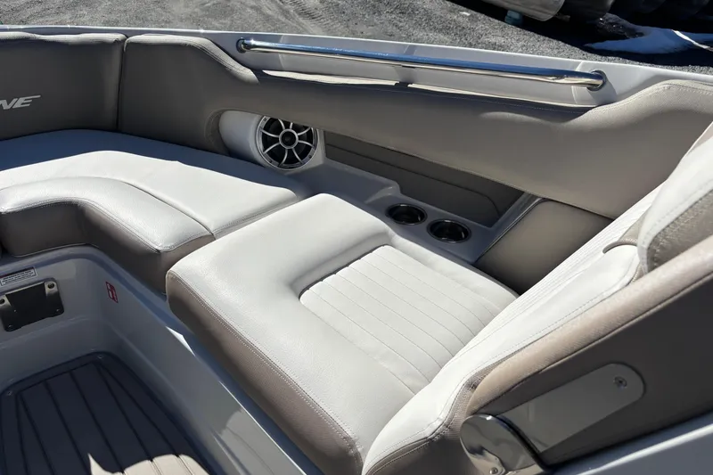 Slide: The Image of 2026 Crownline 278 SS boat interior with plush seating and cup holders. - 3