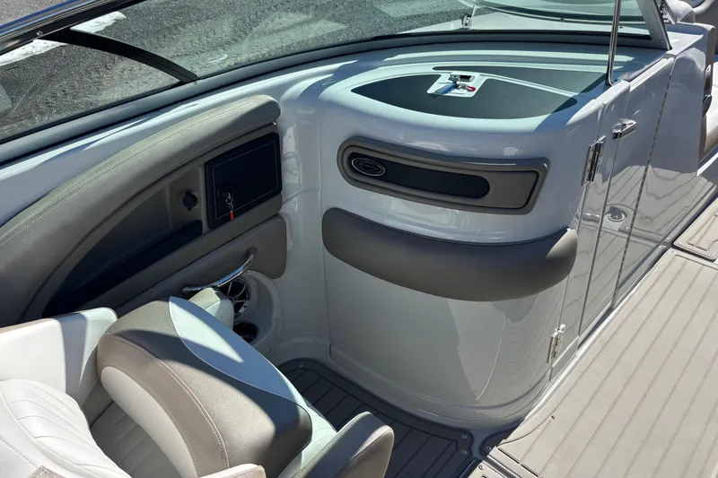 Slide: The Image of 2026 Crownline 278 SS boat interior with sleek seating and modern dashboard design. - 7