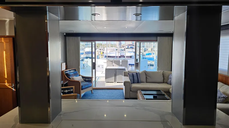 Slide: The Image of Luxurious 2009 Custom Flybridge Motoryacht interior with elegant seating and marina view. - 20
