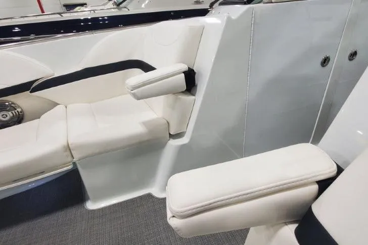 Slide: The Image of 2008 Formula 310 Bowrider interior with white seating and armrests. - 12