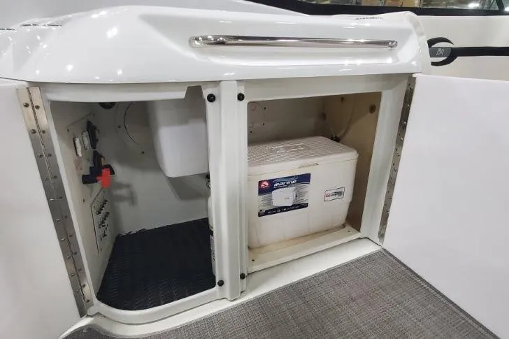 Slide: The Image of 2008 Formula 310 Bowrider storage compartment with marine battery inside. - 15