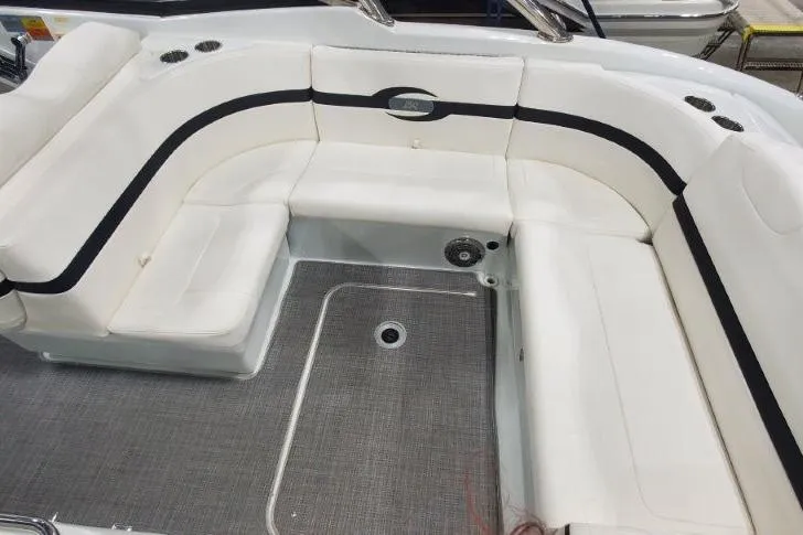 Slide: The Image of 2008 Formula 310 Bowrider interior with white seating and gray flooring. - 21