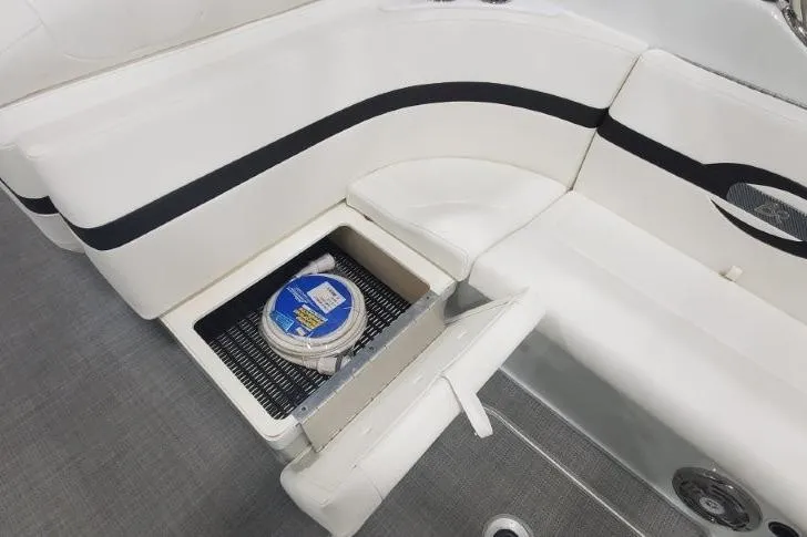 Slide: The Image of 2008 Formula 310 Bowrider interior with storage compartment and seating. - 24