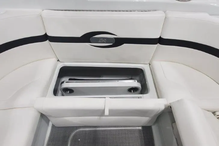 Slide: The Image of 2008 Formula 310 Bowrider interior seating with storage compartment open. - 25