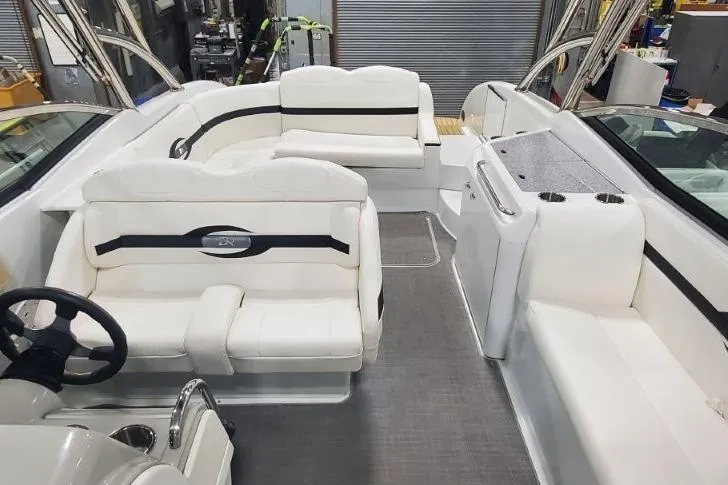 Slide: The Image of 2008 Formula 310 Bowrider interior with white seating and modern design. - 6