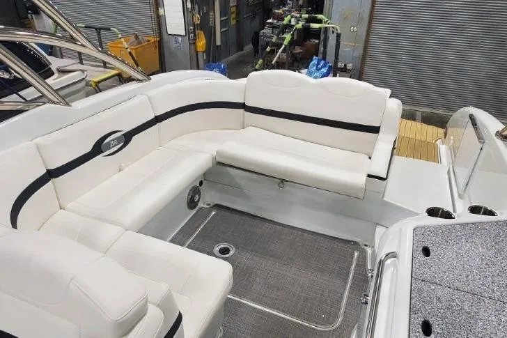 Slide: The Image of 2008 Formula 310 Bowrider interior with white seating and modern design. - 7