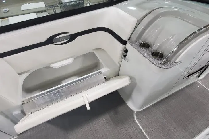 Slide: The Image of 2008 Formula 310 Bowrider interior with cup holders and seating area. - 8