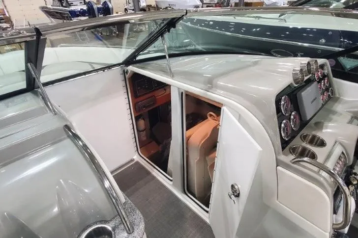 Slide: The Image of 2008 Formula 310 Bowrider cockpit with dashboard and cabin entrance. - 9