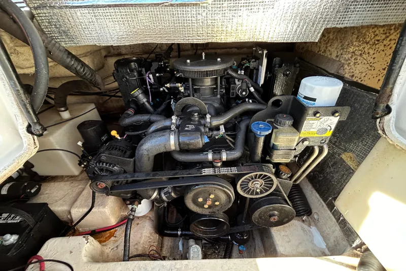 Slide: The Image of Engine compartment of a 2008 NauticStar 232DC Sport Deck boat. - 10