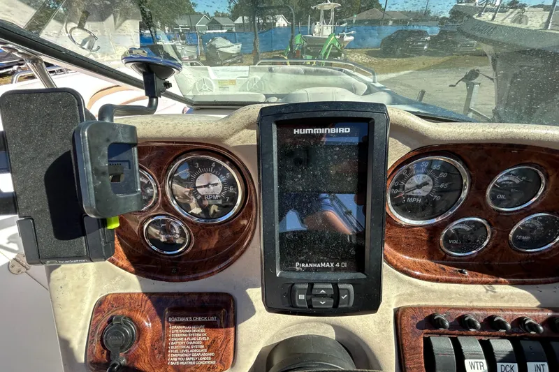 Slide: The Image of Dashboard of 2008 NauticStar 232DC Sport Deck with gauges and Humminbird PiranhaMAX 4 DI. - 7
