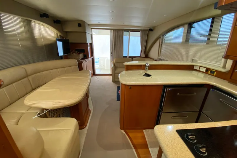 Slide: The Image of Luxurious interior of a 2008 Silverton 45 Convertible yacht with modern amenities. - 31