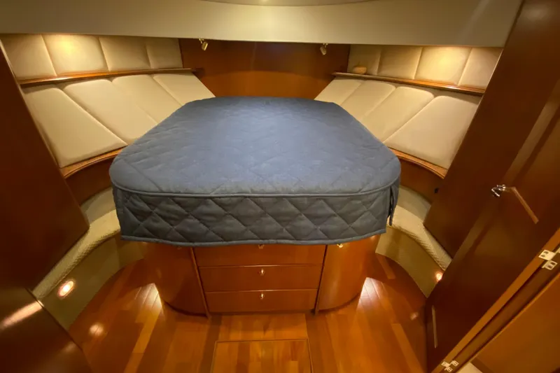 Slide: The Image of Luxurious cabin interior of a 2008 Silverton 45 Convertible yacht with a cozy bed. - 33