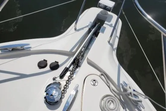 Slide: The Image of Bow of 2008 Silverton 45 Convertible yacht with anchor chain and rope. - 4