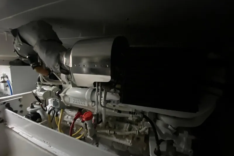 Slide: The Image of Engine compartment of a 2008 Silverton 45 Convertible boat, featuring a Volvo Penta engine. - 44