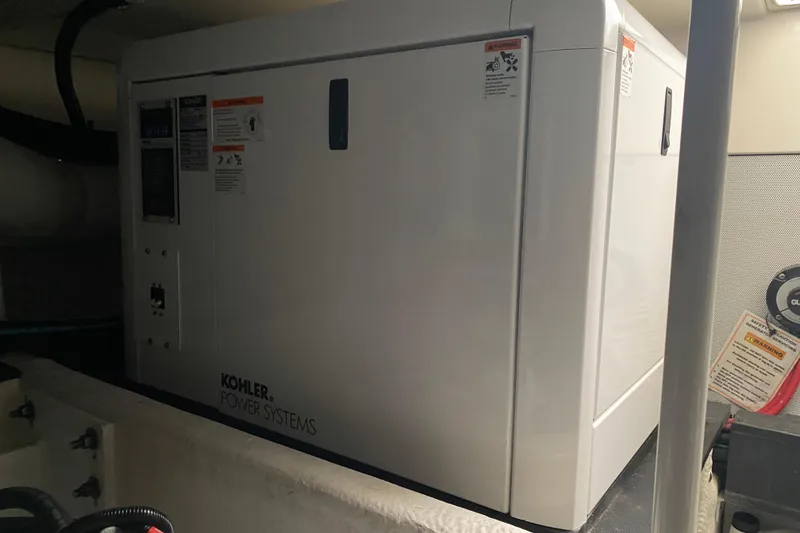 Slide: The Image of Kohler power system in 2008 Silverton 45 Convertible yacht engine room. - 48