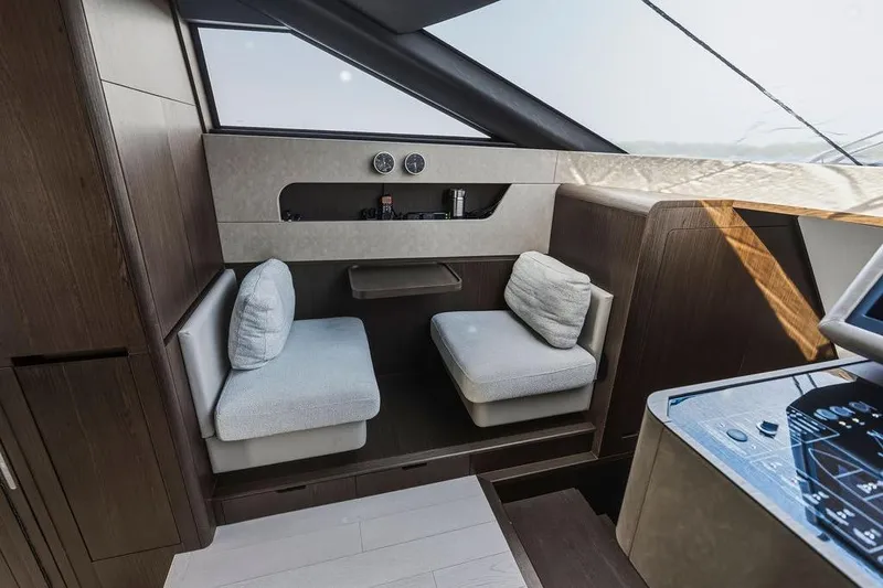 Slide: The Image of Luxurious interior of 2023 Ferretti Yachts 860 with modern seating and sleek design. - 22