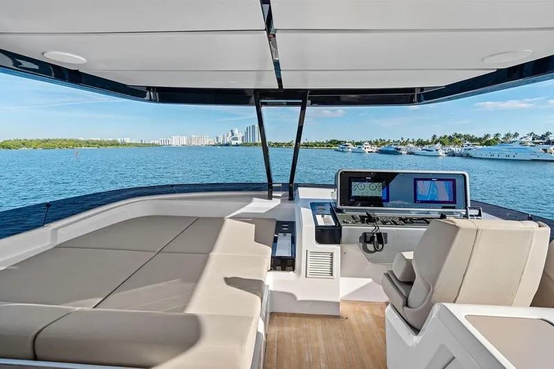 Slide: The Image of Luxurious 2023 Ferretti Yachts 860 interior with scenic ocean view and modern navigation system. - 26
