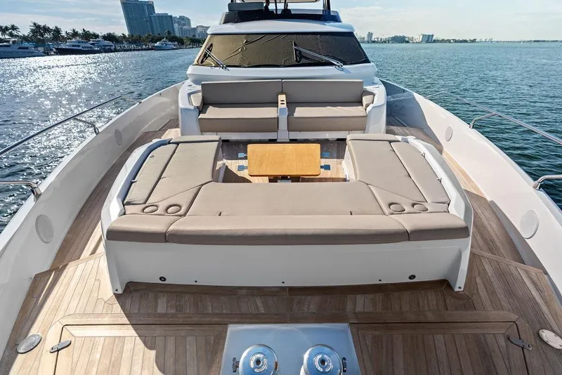 Slide: The Image of Luxurious 2023 Ferretti Yachts 860 deck with elegant seating and ocean view. - 38