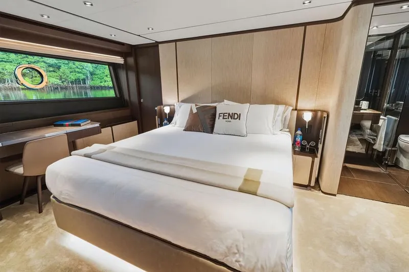 Slide: The Image of Luxurious bedroom interior of 2023 Ferretti Yachts 860, featuring elegant design and scenic window view. - 40