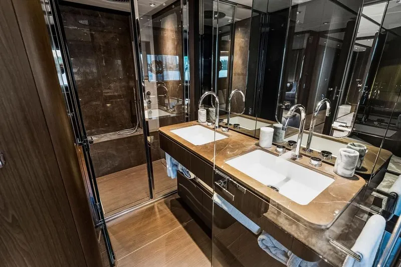 Slide: The Image of Luxurious bathroom in 2023 Ferretti Yachts 860, featuring dual sinks and elegant design. - 43