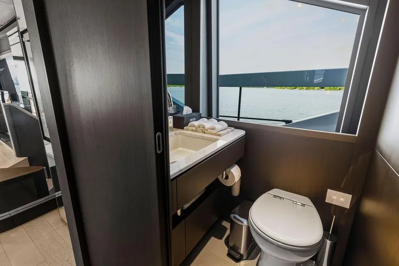 Slide: The Image of Luxurious bathroom on 2023 Ferretti Yachts 860 with ocean view. - 18