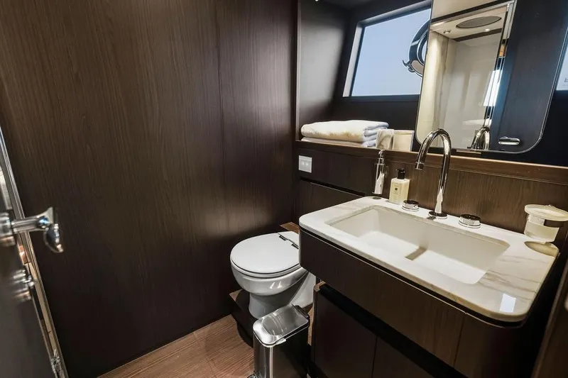 Slide: The Image of Luxurious bathroom in 2023 Ferretti Yachts 860, featuring modern fixtures and elegant design. - 54