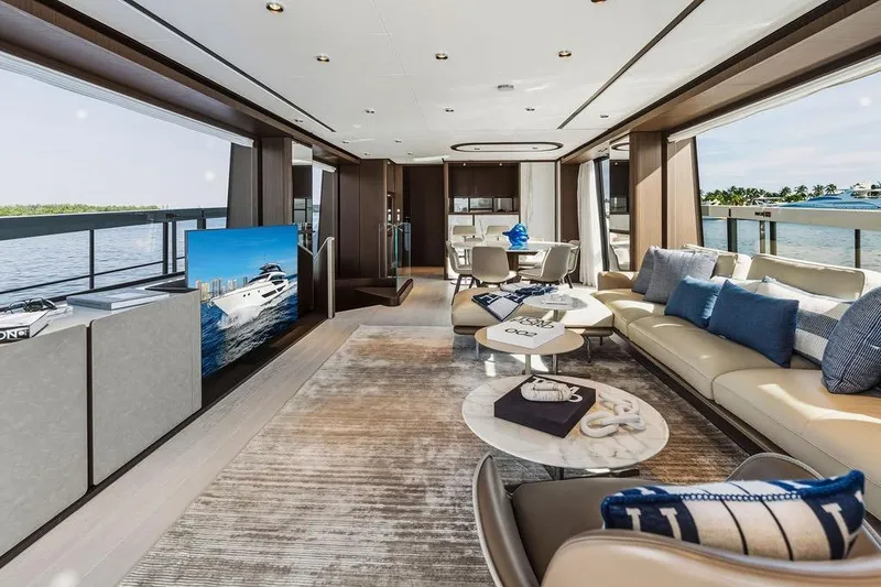 Slide: The Image of Luxurious interior of 2023 Ferretti Yachts 860 with elegant seating and panoramic views. - 9