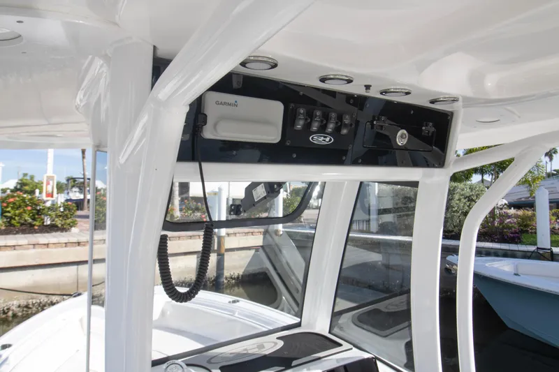Slide: The Image of Interior view of 2026 Sea Hunt Ultra 245 SE boat with Garmin electronics. - 5