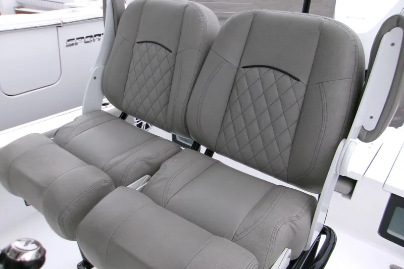 Slide: The Image of 2024 Sportsman Masters 267OE Bay Boat seats with diamond-stitched upholstery. - 11