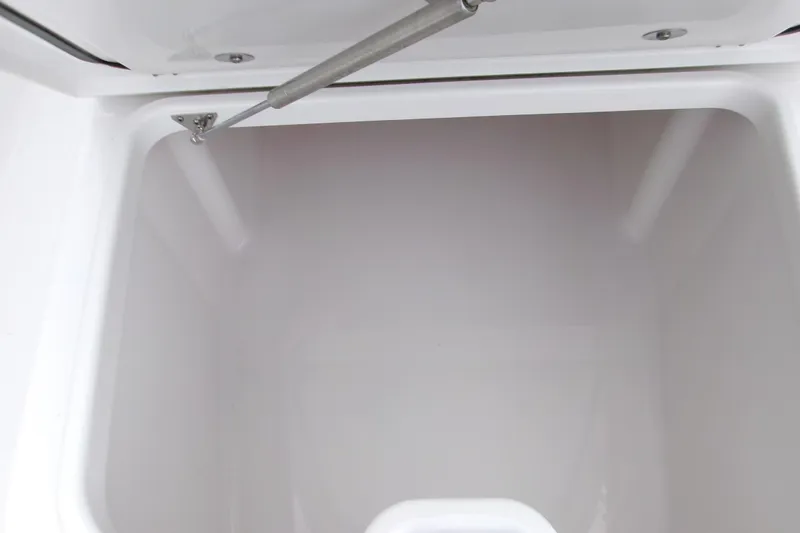 Slide: The Image of 2024 Sportsman Masters 267OE Bay Boat storage compartment interior view. - 15