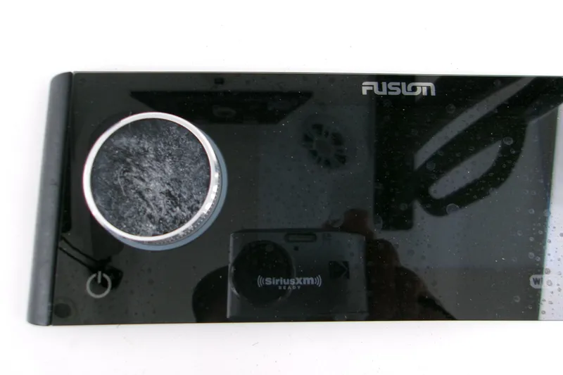 Slide: The Image of Fusion audio system on 2024 Sportsman Masters 267OE Bay Boat dashboard. - 18