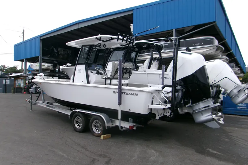 Slide: The Image of 2024 Sportsman Masters 267OE Bay Boat on trailer, parked at marina. - 20